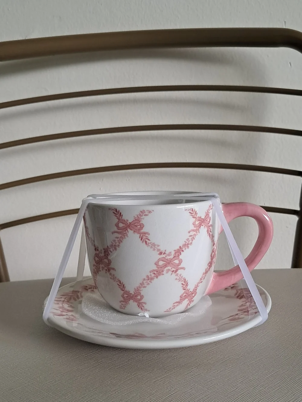 Pink and White Bow Ceramic Teacup and Saucer Set